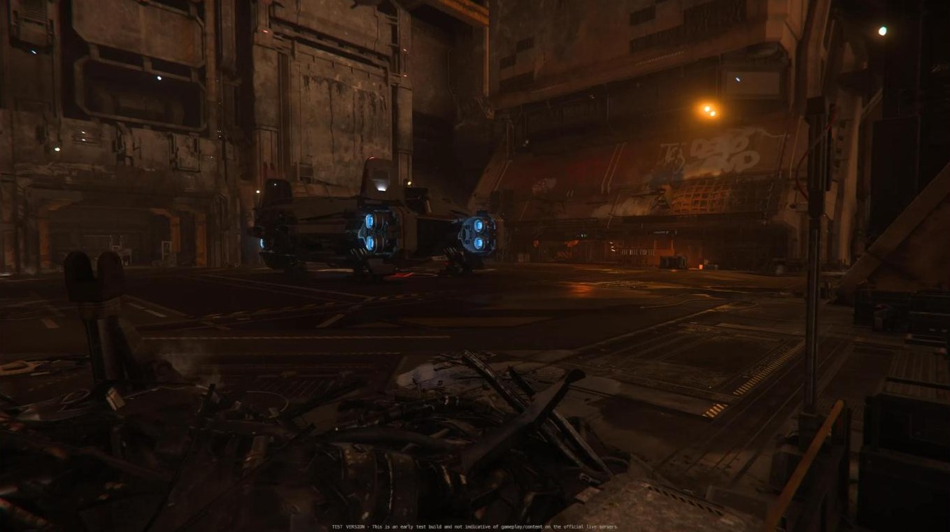 Ship parked in a grungy hangar