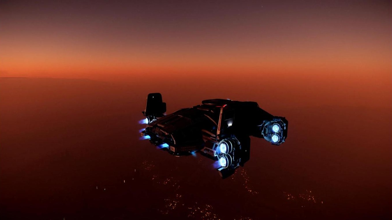 Ship flying at sunset