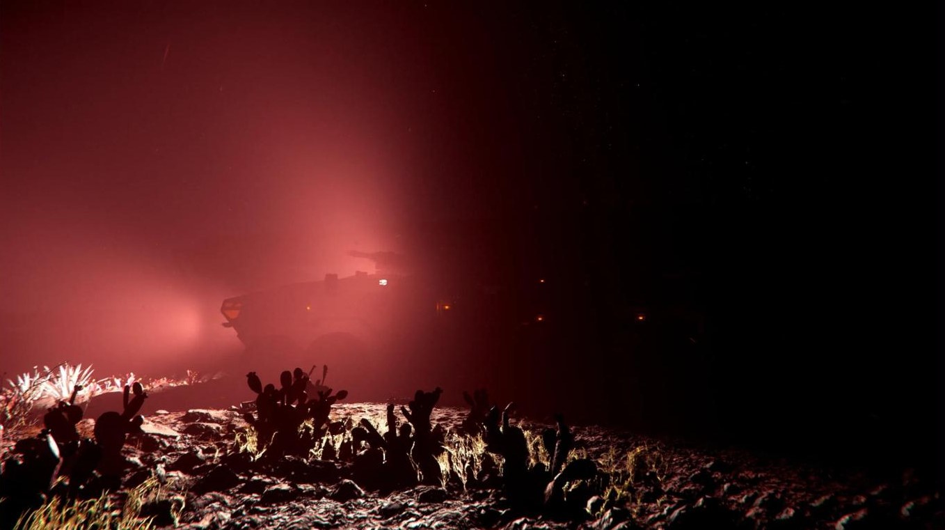 Vehicle in red mist at night